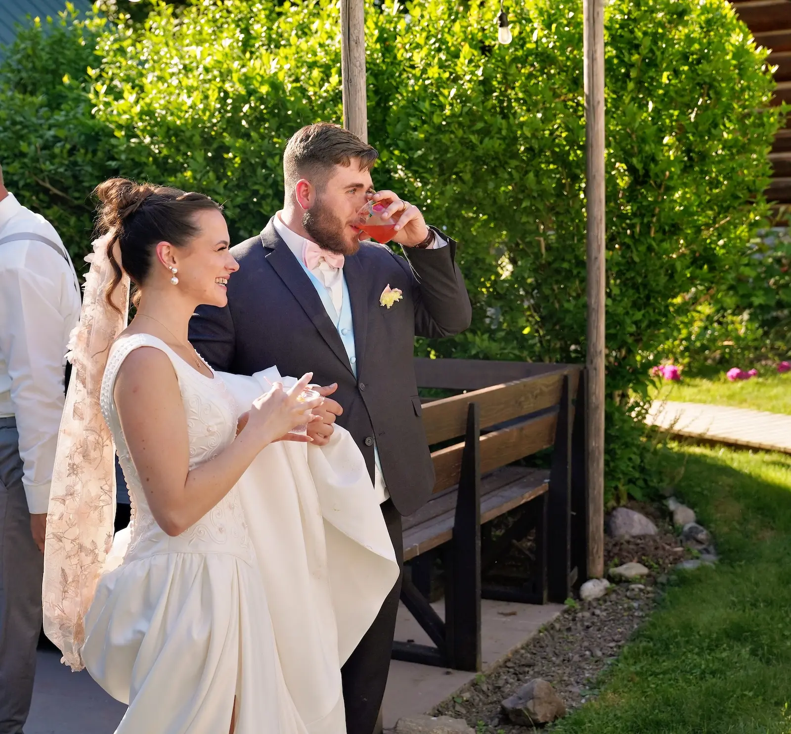 Bride and groom enjoying signature cocktails