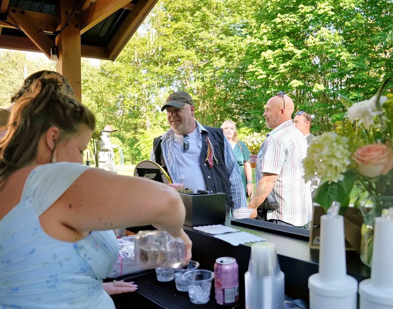 Mobile bartender serving guests at a Spokane wedding bar